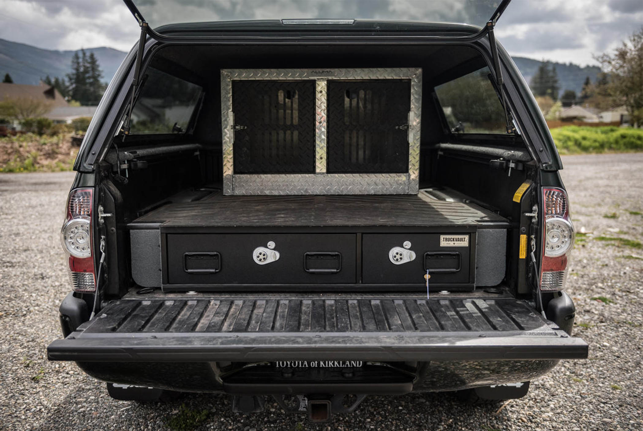 A covered bed TruckVault system for secure bird hunting storage.