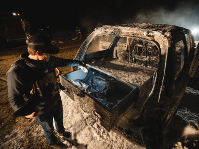 Durango burnt with TruckVault installed inspecting damage and interior of drawer remains untouched