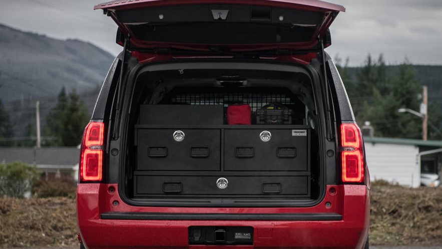 A Commander Line TruckVault in the back of a Chevy Suburban.