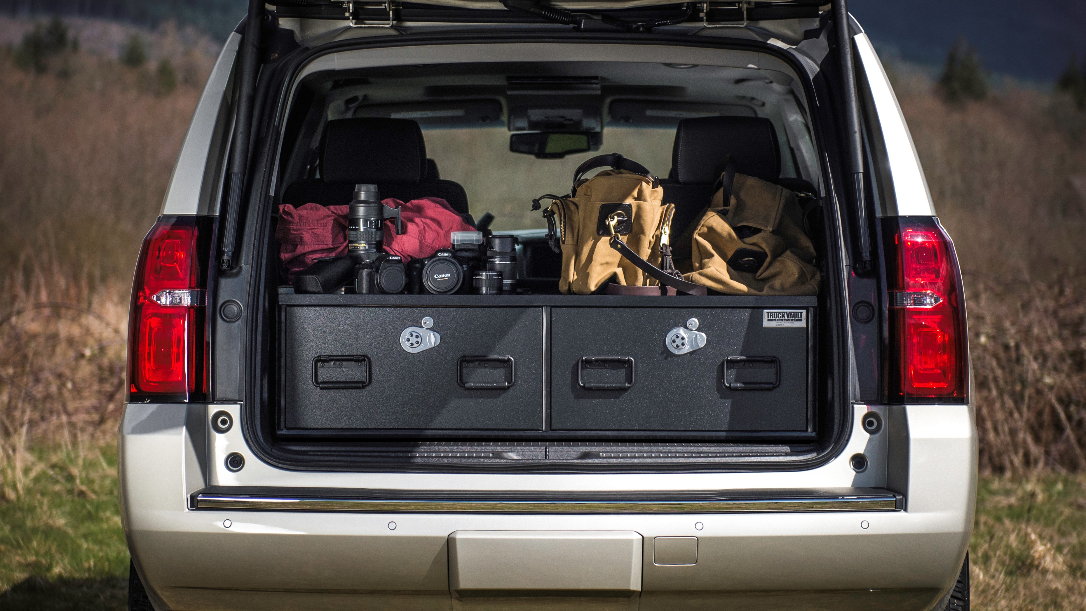 A Chevy Tahoe with a TruckVault in the trunk used for photography.