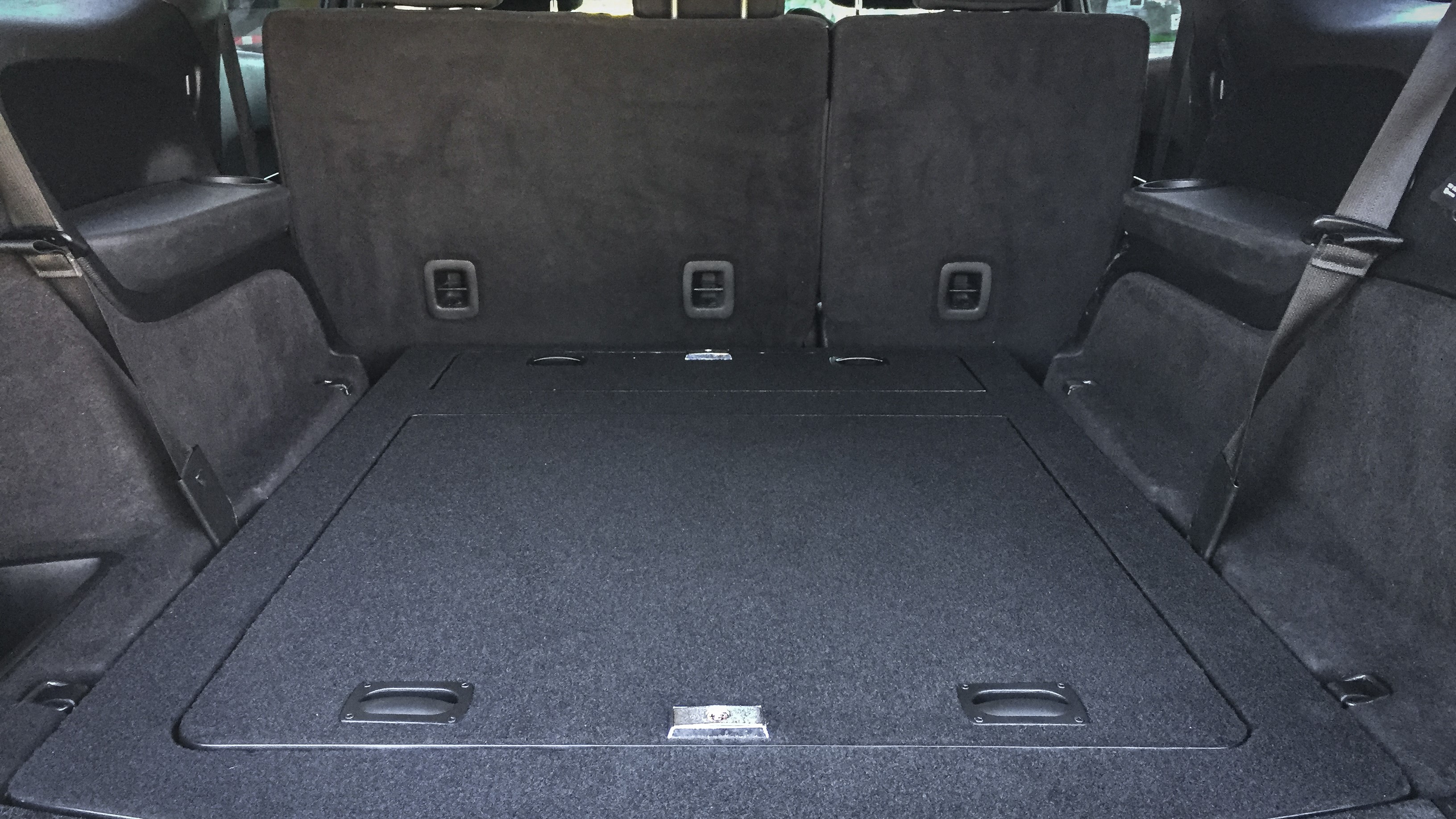 A FloorVault installed in the back of a Dodge Durango.