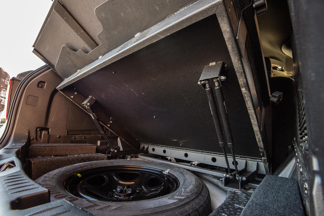 A TruckVault lift system in the back of a 2020 Ford Explorer.