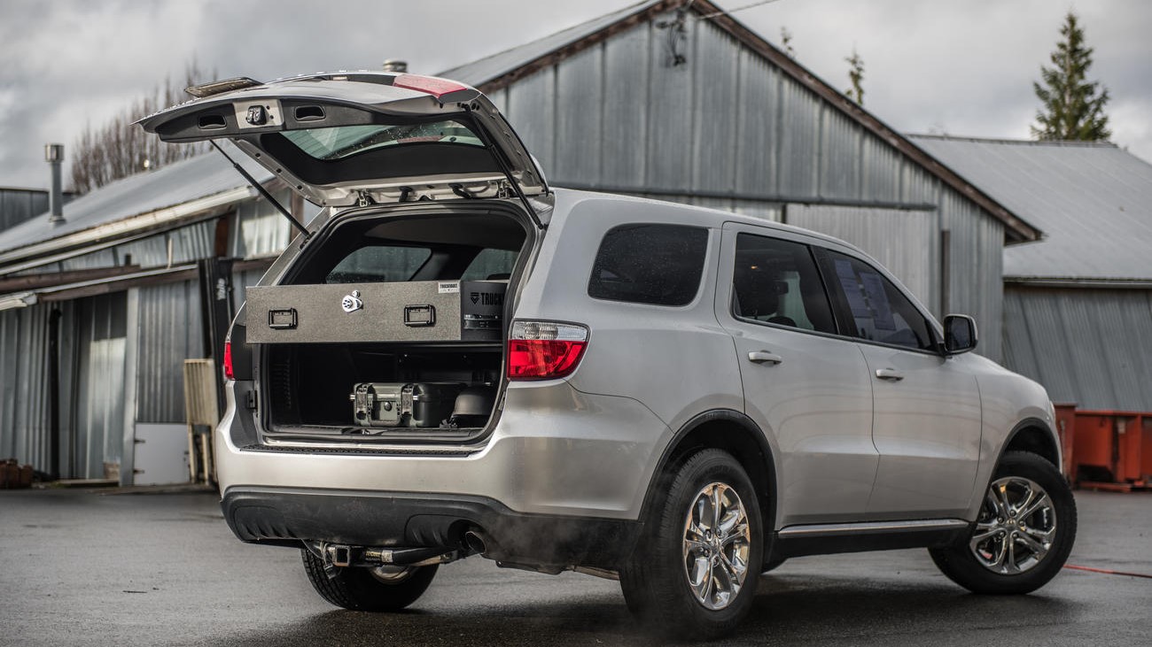 An Elevated TruckVault installed in the back of a Dodge Durango.