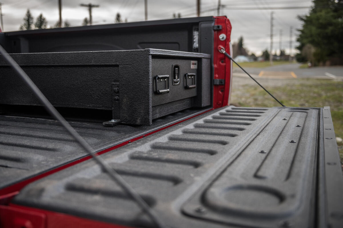 half with all weather TruckVault secure truck bed storage system in Dodge Ram