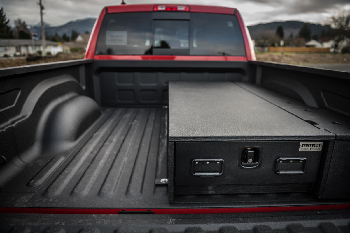 half with all weather TruckVault secure truck bed storage system in Dodge Ram