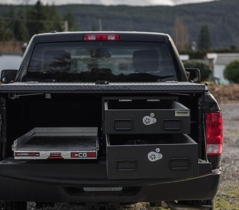 pickup truck with half width drawers stacked on passenger side and cargo glide on driver side
