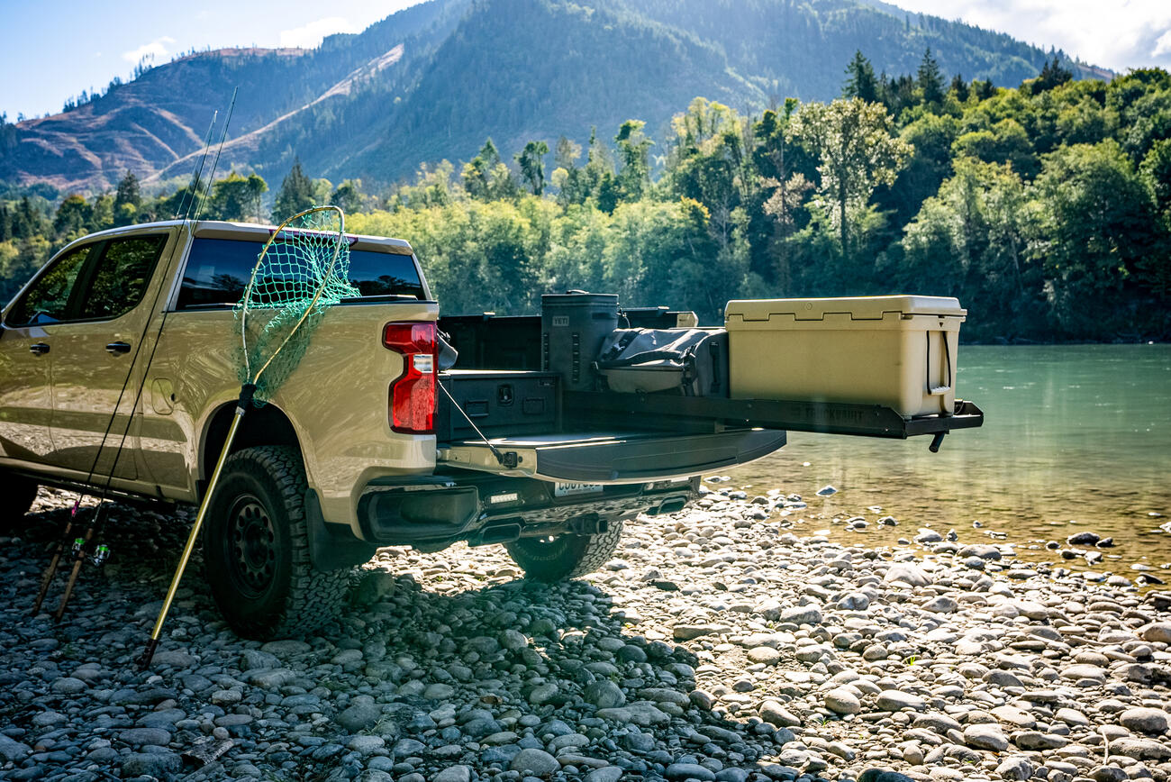 TruckGlide Half-Width Product with a Yeti cooler on top.