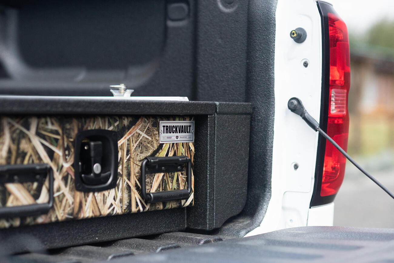 TruckVault All-Weather storage system with Mossy Oak drawer front.