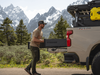 2023 Chevrolet Silverado 1500 All-Weather Offset TruckVault Drawers Side View with man pushing drawer closed