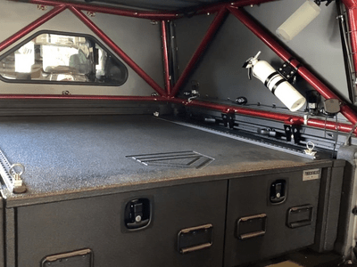 A Jeep Gladiator with a TruckVault storage system.