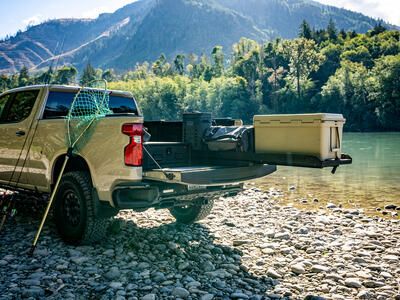 TruckGlide Half-Width Product with a Yeti cooler on top.