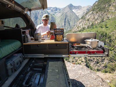 Cooking meal off of TruckVault Base Camp 5